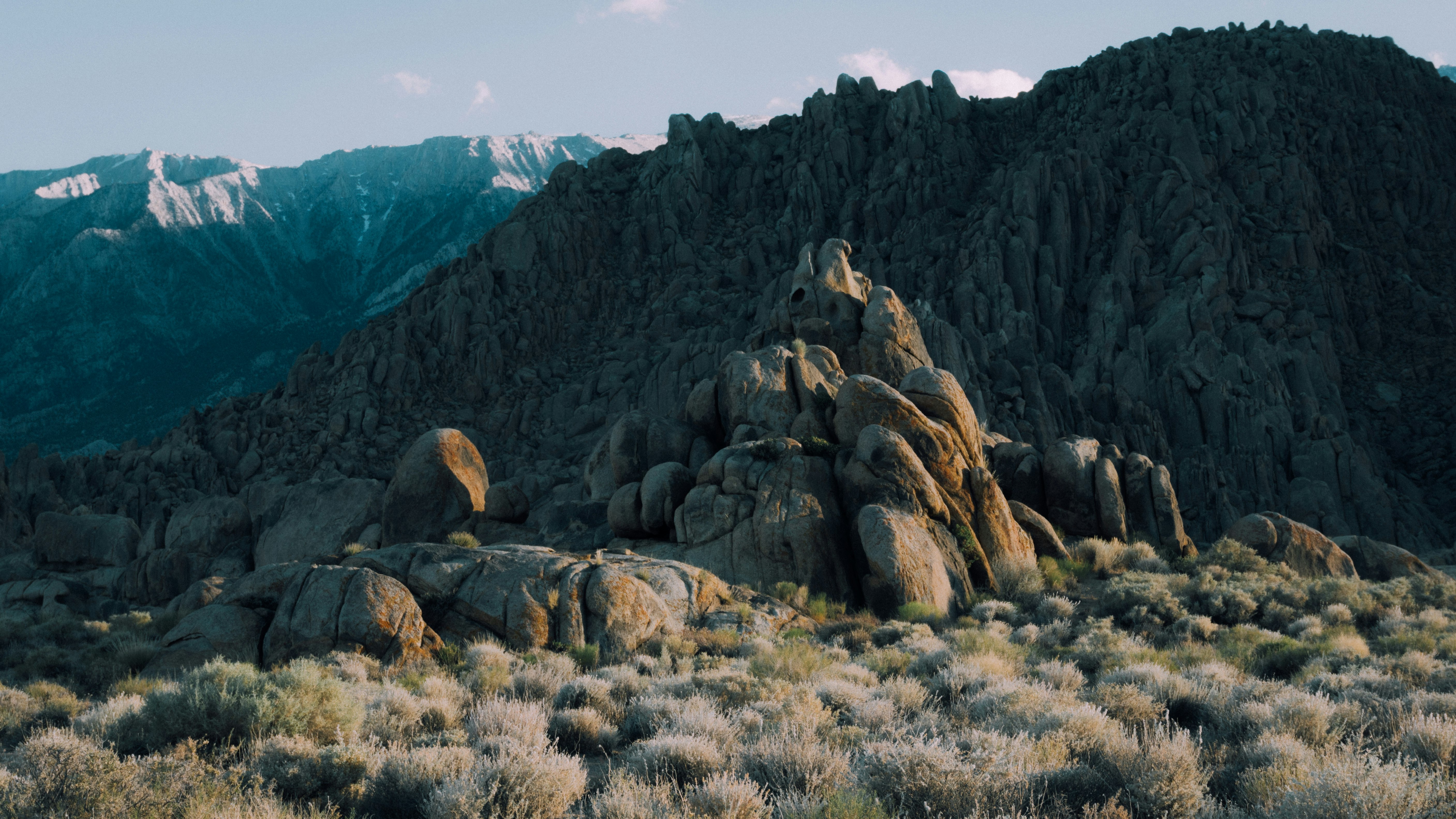 brown rock formation under blue sky during daytime